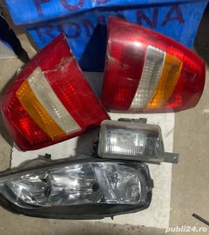 Far, proiector si stopuri (triple) Opel Astra G an 2007