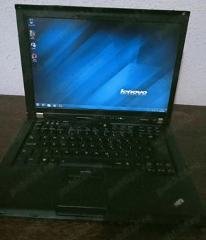 Laptop Lenovo și încărcător 