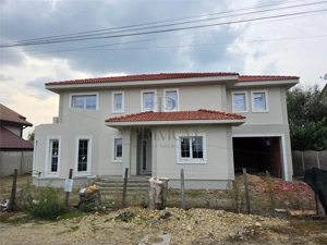 Casa individuala superba - teren 730 mp - garaj - 5 dormitoare - living 57mp.
