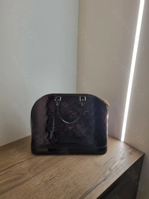 Louis Vuitton model Alma 