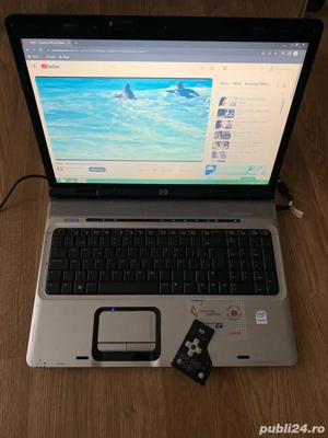 Laptop HP Display mare 17,3 inch Led,Cu telecomanda,320gb memorie perfect functional cu incarcator s