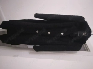 Vind  palton astrahaan foartae frumos