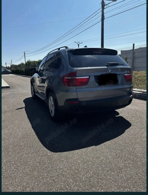 BMW X5 din anul 2008 - imagine 4