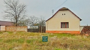 Casă cu potențial, teren generos de 1.440 mp   Secusigiu, Arad