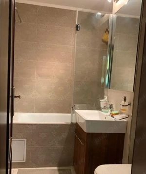 In Centru pe vulevardul Uniirii dau in chirie apartament cu 2 camere