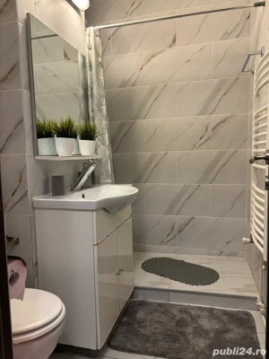 Inchiriez in regim hotelier apartament nou renovat 2 camere parter - imagine 5