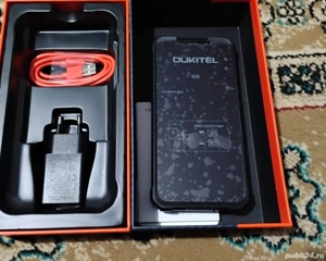 Vand sau schimb pachet Oukitel.