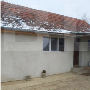 Casă de vânzare într-o zonă liniștită, sus pe deal, cu priveliște superba