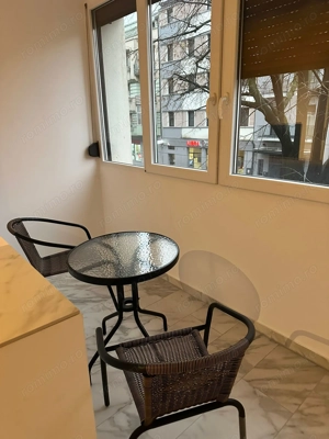 Inchiriez apartament cu 3 camere în centru  - imagine 2