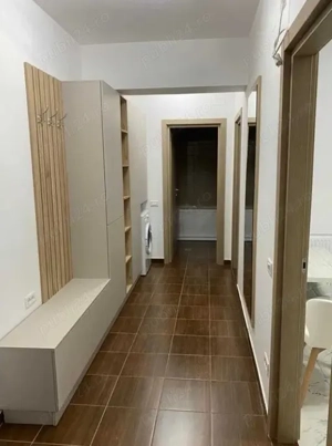 Dau in chirie un apartament decomandat cu 2 camere cu centrala pe gaz