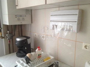 Apartament Spatios - Etaj Intermediar - Bloc Anvelopat - Centrala Proprie - Clima - Zona Dambovita - imagine 2