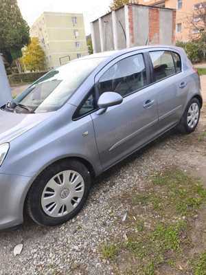 Opel Corsa D 2008 1.2 benzina - imagine 10