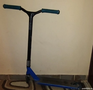 Vând trotineta sărituri Oxelo 