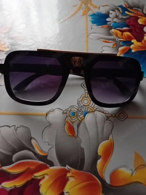 Vând ochelari bărbătești 