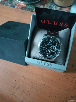 ceas guess pret 600 roni