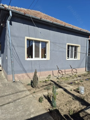 Casă de vânzare în Ghiroda   1.000 mp teren | 4 camere | 2 băi | 2 intrări separate