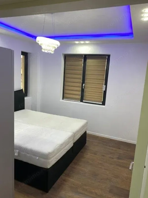 Inchiriez ap.2 camere in Zona Muzicescu, parter, suprafata utila de 55 mp. - imagine 2