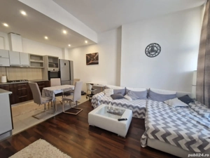 Inchiriez apartament 61mp utili