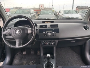 Suzuki Swift 1,3 b - imagine 8