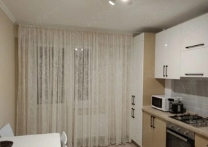  1 Mai dau in chirie apartament decomandat cu 2 camerea - imagine 3