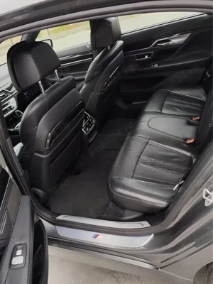 BMW 750 LXi 455 cp - imagine 7