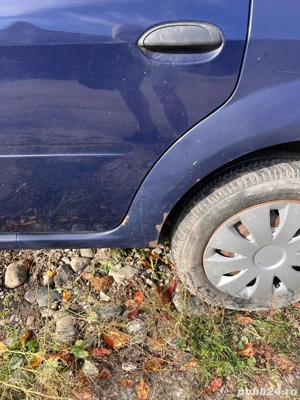 vand dacia logan 2011 - imagine 3