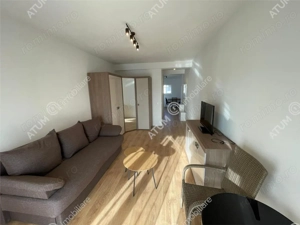 Garsoniera decomandata etaj 1 cu balcon si loc parcare in zona de Vest - imagine 3