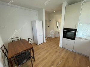 Garsoniera decomandata etaj 1 cu balcon si loc parcare in zona de Vest - imagine 6