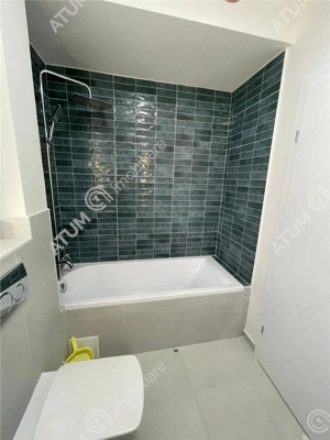 Garsoniera decomandata etaj 1 cu balcon si loc parcare in zona de Vest - imagine 9