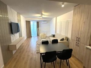 Apartament de lux 58 mp utili terasa 15 mp parcare in Evolution - imagine 3