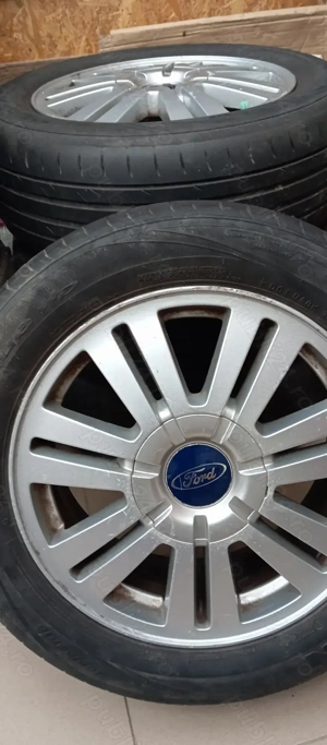 vând set de 4 jante din aliaj cu anvelope dimensiunea 205/55/16