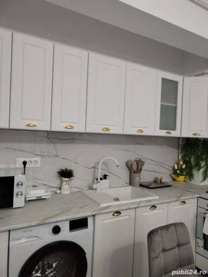 Închiriez apartament 2 camere tip studio  - imagine 2