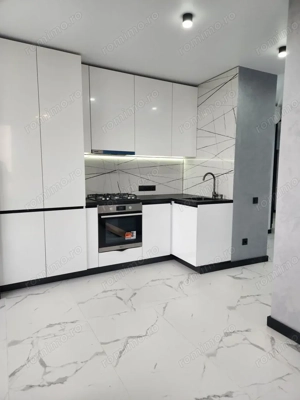 Va oferim spre închiriere un apartament spațios de 2 camere, situat pe Bulevardul Decebal - imagine 3