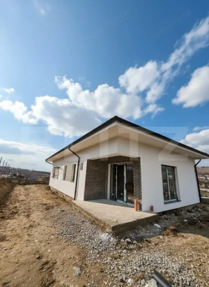 Casa pe un nivel 105 mp cu pod inalt mansardabil de 70mp, teren 500mp, Chinteni