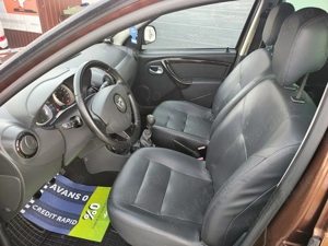 Dacia Duster 1.5 dCi 4x4 Prestige - imagine 11