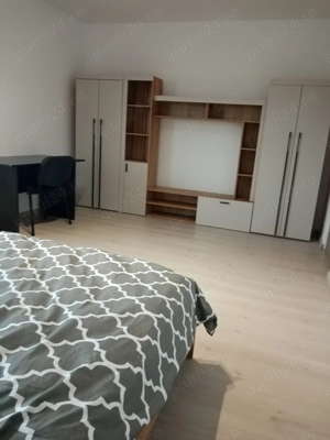 Dau in chirie apartament 3 camere decomandat - imagine 2