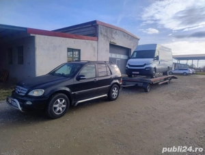 Transport auto si utilaje agricole pe platforma 