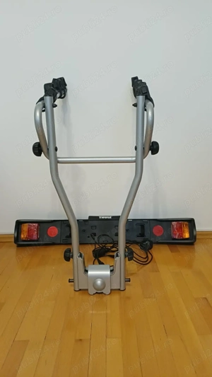 Suport Thule cârlig remorcare   4 biciclete + light board