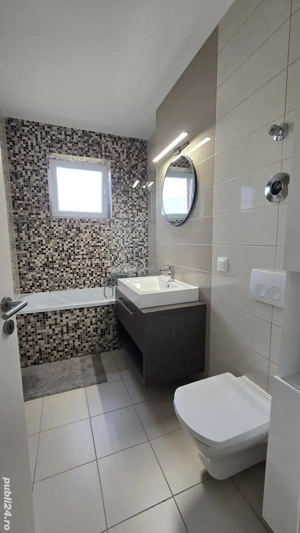 Apartament de 2.5 camere cu 2 balcoane și parcare privată