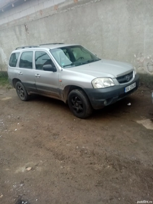 Vînd mazda tribute 4x4