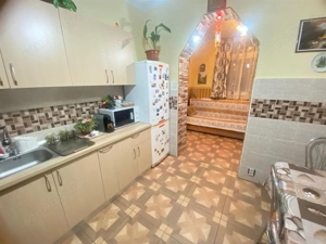 Casuta individuala p+m CENTRALA PROPRIE terasa curte comuna