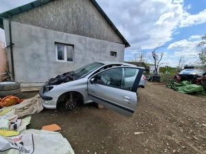 Dezmembrez peugeout 206 1.4 benzina  - imagine 3