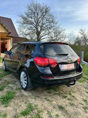 Opel Astra j 2011 - imagine 4