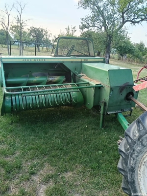 vând presa John Deere 332