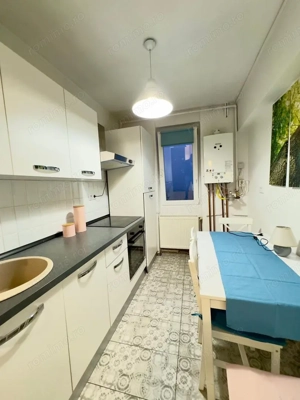 Aproape de centru, amenajat si intr-un bloc izolat termic. Centrala termica proprie. - imagine 9