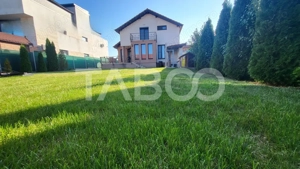 Casa individuala 5 camere 2 garaje 500 mp curte 2 terase in Sura Mica