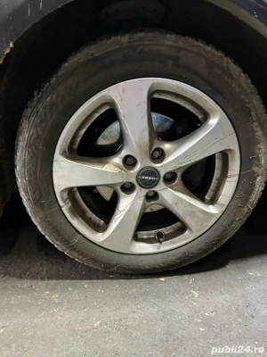 Se vând 4 jante cu caucicuri de iarna in stare perfecta Opel