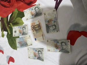 Bancnote de 20 de lei și bacnota de 50 euro din 2002 