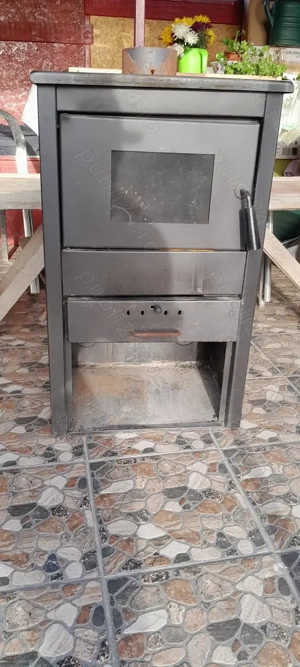 Vând  sobă samotata puțin folosita. 