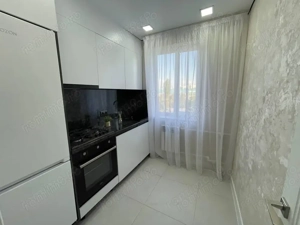 Ofer spre inchiriere apartament cu 2 camere decomandate in zona 1 Mai - imagine 3
